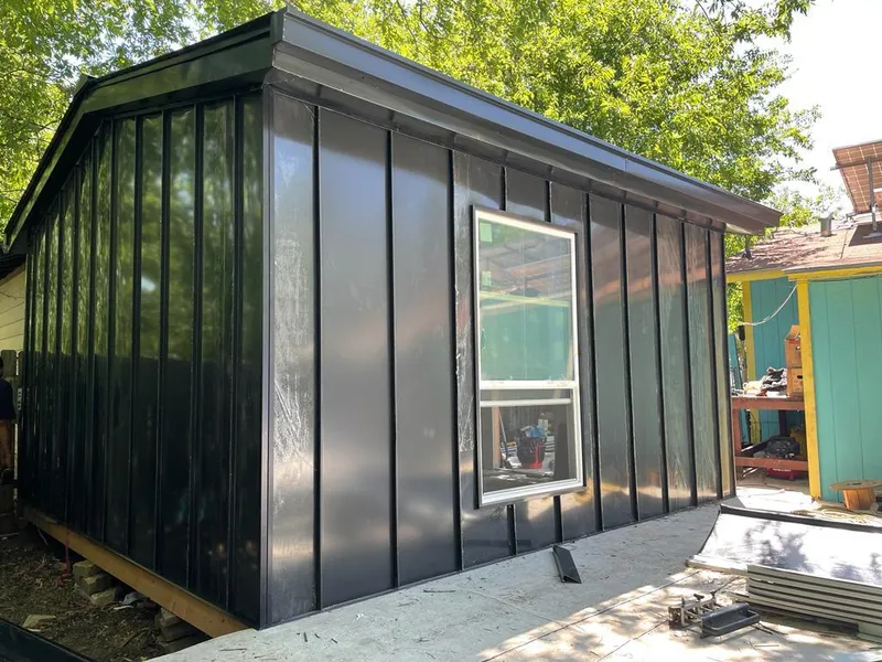 Black standing seam metal wall panels for Roof Inspection in Maitland